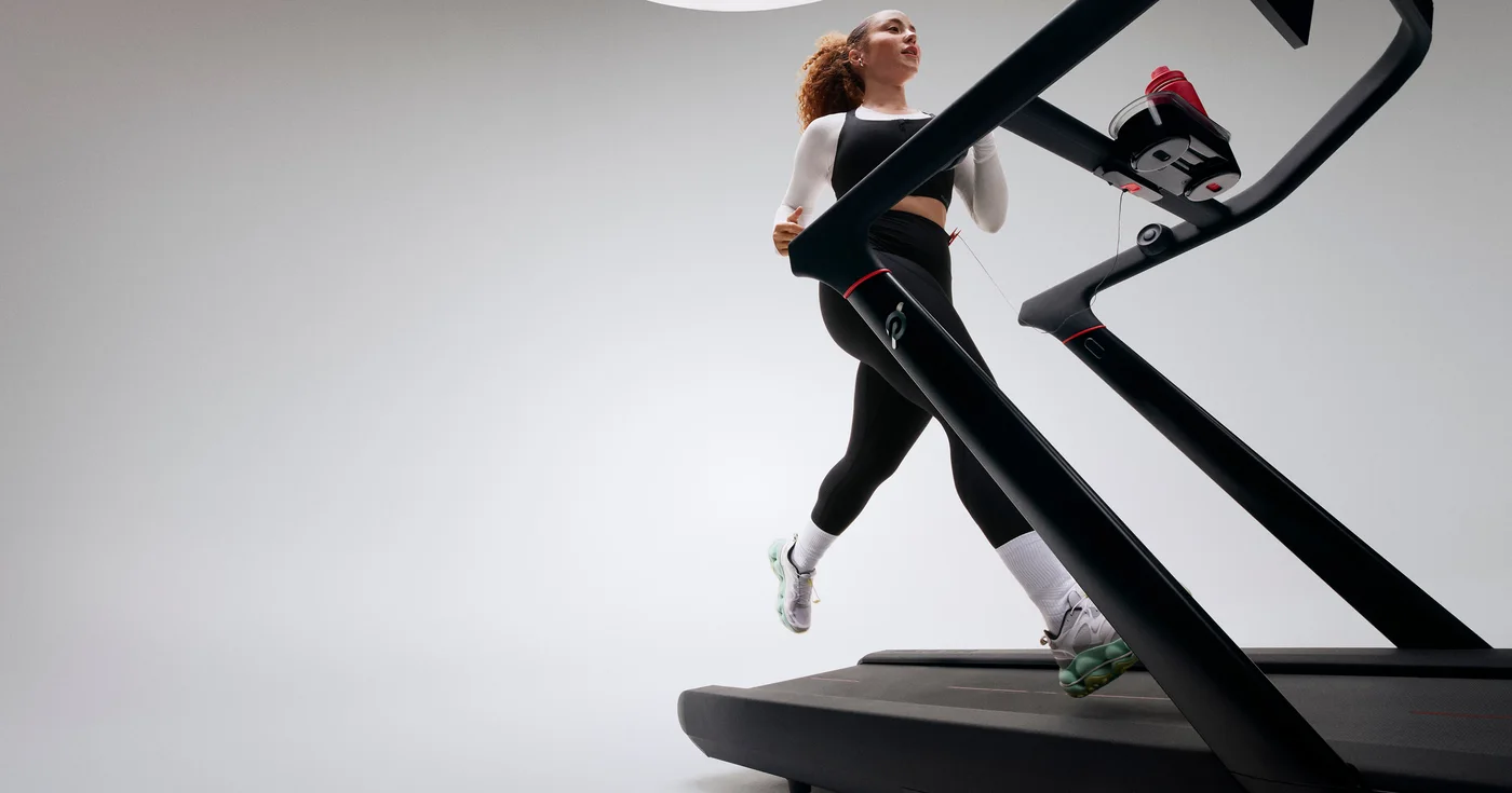 Runner training on a Peloton Tread