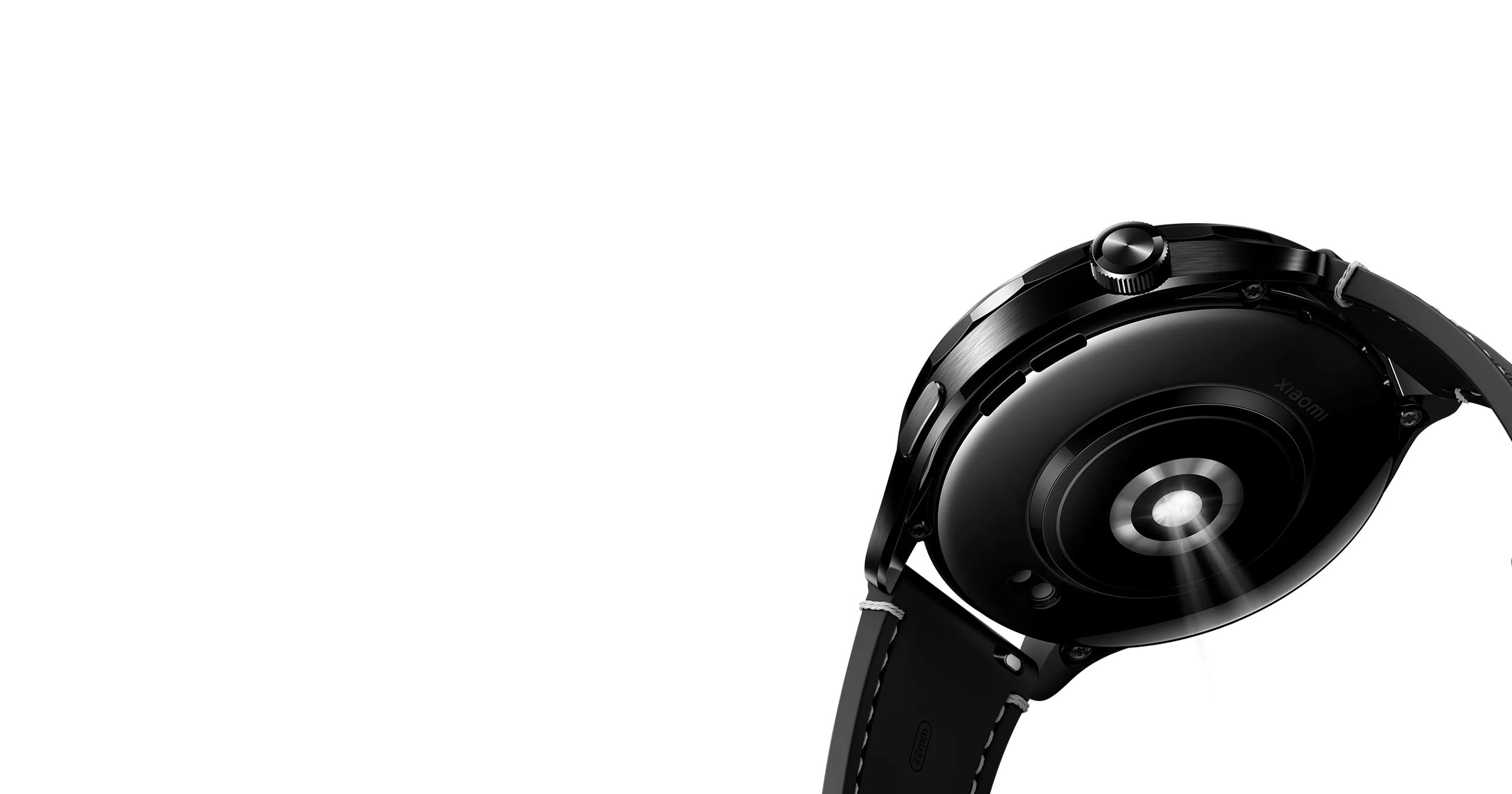 Xiaomi Watch S4 worn on the wrist, seen from below with the heart-rate sensor glowing