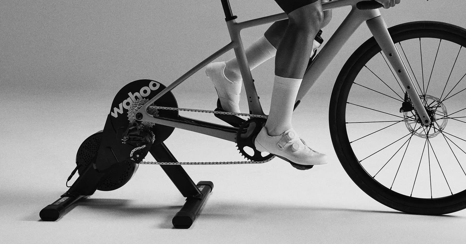 Cyclist riding a bike mounted on a Wahoo KICKR CORE smart trainer